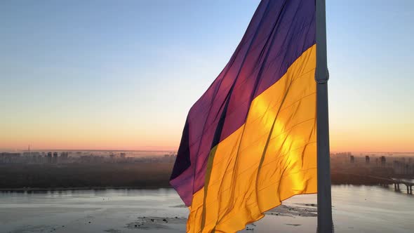 Ukrainian Flag in the Morning at Dawn. Aerial. Kyiv. Ukraine