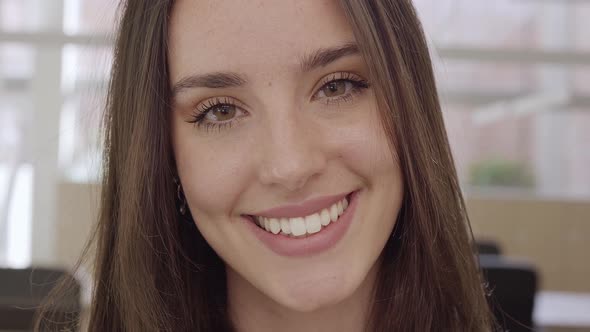 Smiling Caucasian Woman Pretty Face Looking at Camera Closeup Portrait