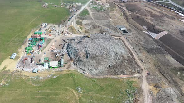 Garbage pile in trash dump or landfill near Cluj-Napoca, Romania.Pollution concept. Drone view.