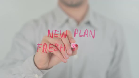 New Plan Fresh Start Writing on Screen with Hand