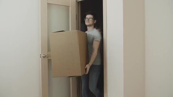 Portrait of Hopeful Goodlooking Newlyweds Moving Into a New Apartment 