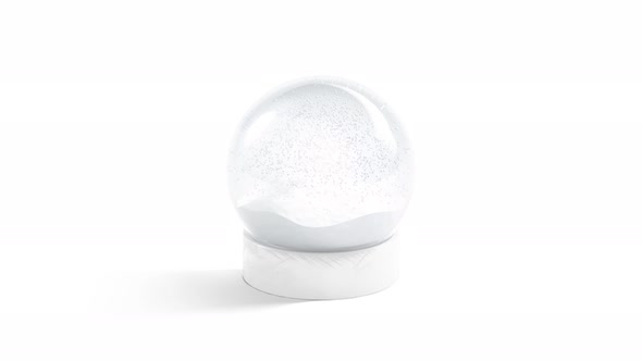 Blank glass snowglobe with snowfall, looped rotation, 4k video