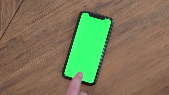 Hand Using Smartphone Table Green Chroma Screen