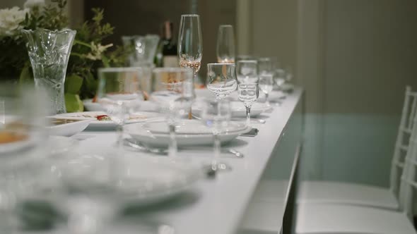 Decorated Table for Newlyweds at a Wedding Celebration, Glasses of Champagne on the Table. Close Up