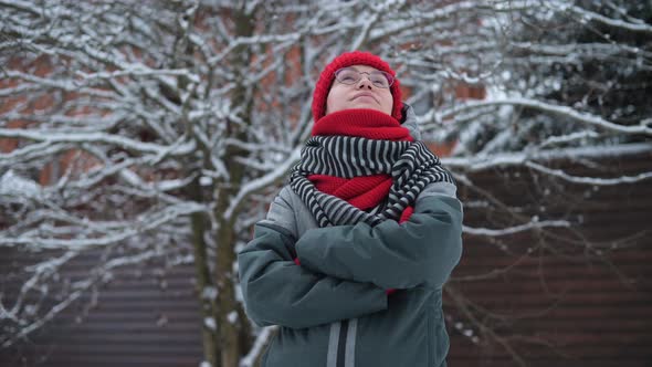 Portrait of a young woman on a winter day outdoors