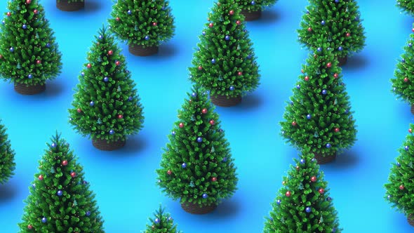 Christmas trees spinning on blue background