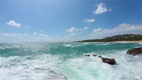 Seashore with Cliffs Waves Crashing on Rocks