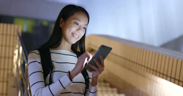 Woman Use of Smart Phone in City at Night 