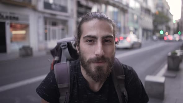 Close Up of a Young Backpacker Smile Visiting the City of Valencia