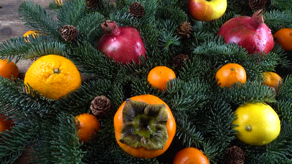 Abies nobilis branch with fruit on an old wooden vintage board