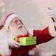 Santa Claus making selfie photos to show that he already has the gift in his hands - VideoHive Item for Sale