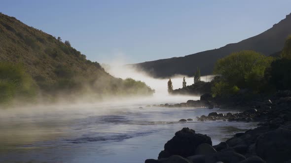 Landscape panoramic view of dense foging over Limay River in Patagonia, Argentine.