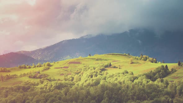 Panoramic View on Mountains and Valley with Clouds