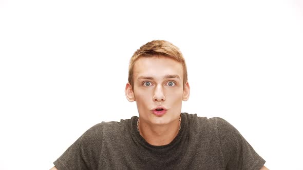 Displeased Young Handsome Man Over White Background