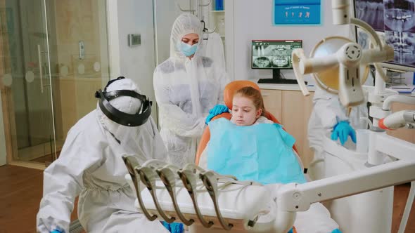 Child with Ppe Suit Taking Care of Dental Health During Coronavirus Pandemic