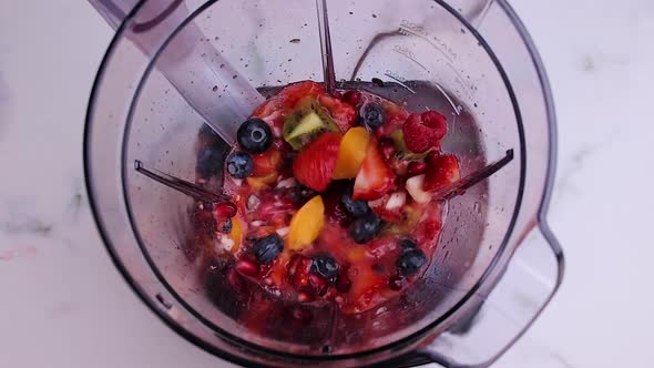 Preparing Fresh Fruit Smoothie in Blender