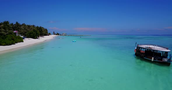 Tropical aerial island view of a white paradise beach and blue water background in high resolution 4