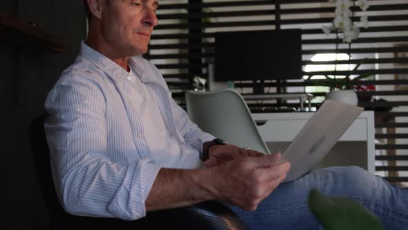 Man using laptop at home