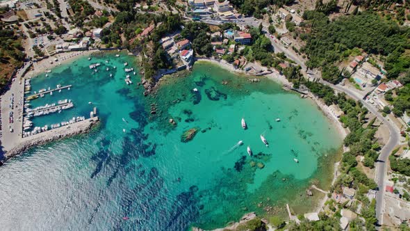 Aerial Drone View to Paleokastritsa Bay Heartshaped Coast with Clear Teal Sea Water