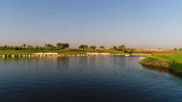 Aerial view of artificial pond in luxury golf club, Dubai, U.A.E.