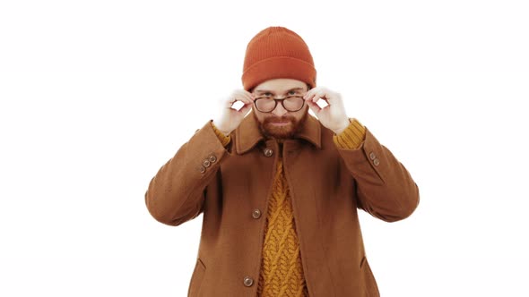 Stylish Caucasian Man Looking Over His Spectacles  Winter Clotches