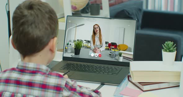 Boy Studying Online at Home