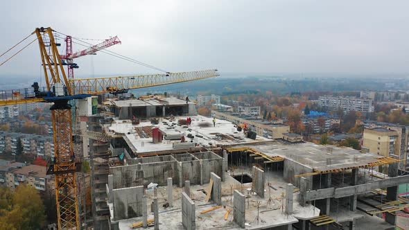 Construction of a residential apartment complex. Multi-storey building under construction. 