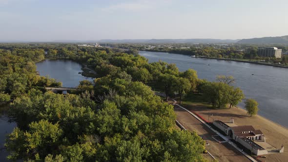 Mississippi River valley in summer. beach and beach house along the shore. Islands of trees. alt