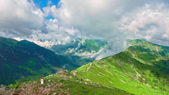 View from Kasprowy wierch to the green valley in the summer, Tatra mountains