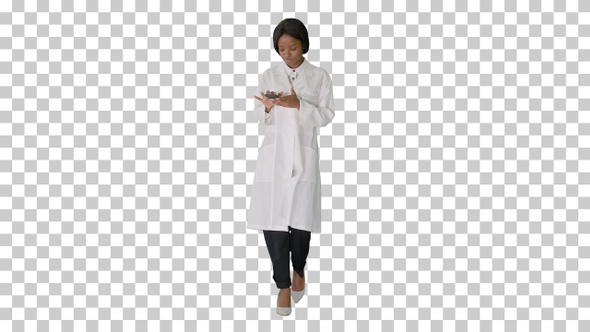 African American female doctor using phone, Alpha Channel