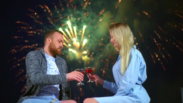 Romantic Couple on Dating Enjoy Fireworks in Night Sky Make Toast Glass Red Wine