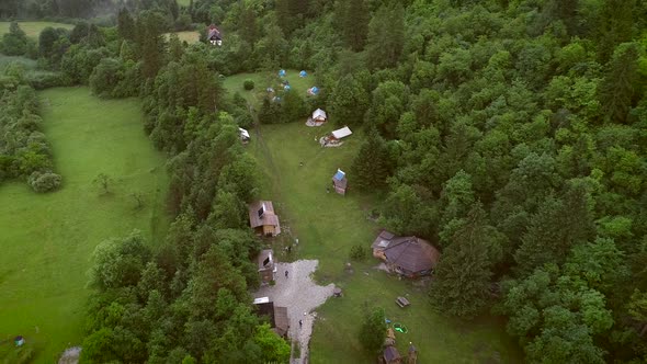 Aerial view of an excursion camp surrounded by nature in Soca river, Slovenia.