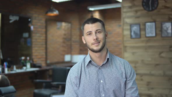 Young Handsome Man in Barbershop