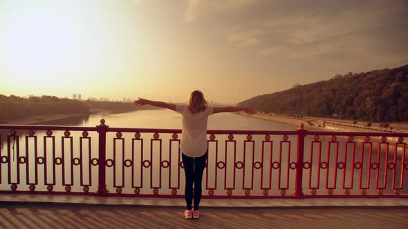 Lady Spreads Her Hands To the Sky