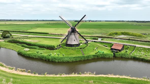 Historic Traditional Typical Dutch Old Windmills Mills on the Rural Countryside in Green Nature