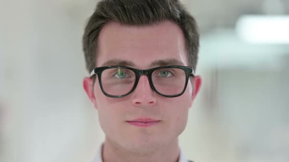 Close Up of Face of Serious Young Man