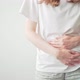 A Woman Holds on to Her Stomach During Her Period - VideoHive Item for Sale