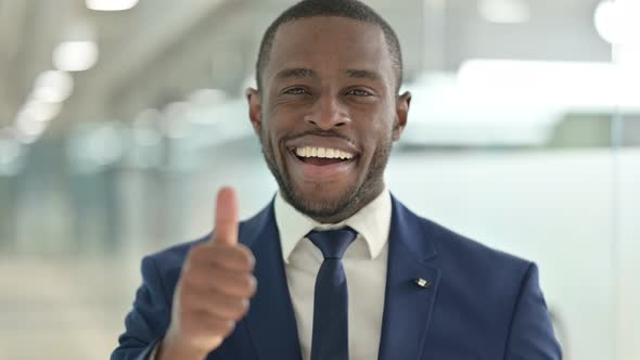 Portrait of African Businessman Showing Thumbs Up Sign 