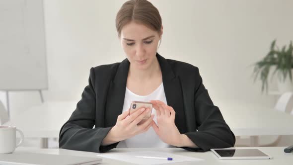 Young Businesswoman Using Smartphone