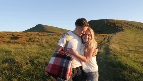 Couple walking and kissing alt