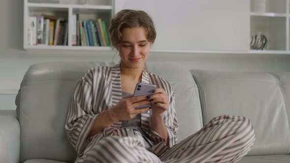 Closeup Woman Typing Message on Mobile Phone