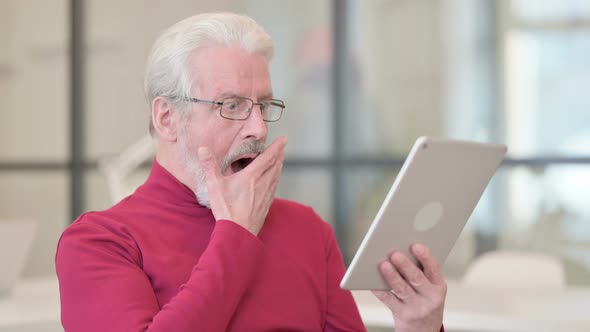 Disappointed Man Reacting To Loss on Tablet