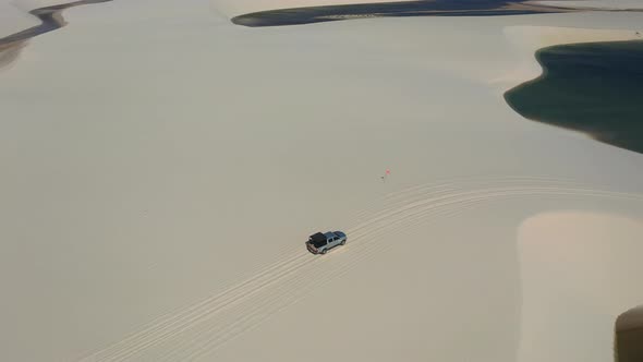 Sand dunes mountains and rain water lagoons at northeast brazilian paradise.