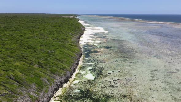 Aerial View of Low Tide in the Ocean Near the Coast of Zanzibar Tanzania Slow Motion