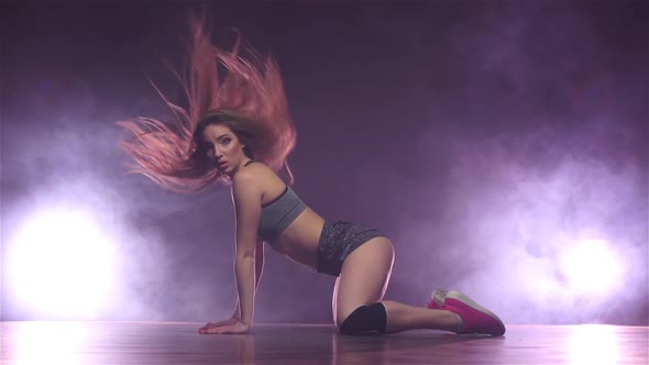 Woman Dancing Twerk in Doggie Pose, Smoky Studio. Slow Motion