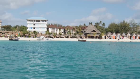 Zanzibar Coastline with Sandy Beach Palms and Hotels