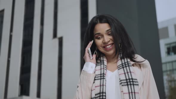 Businesswoman Talking Smartphone on Street. Female Professional Using Cellphone