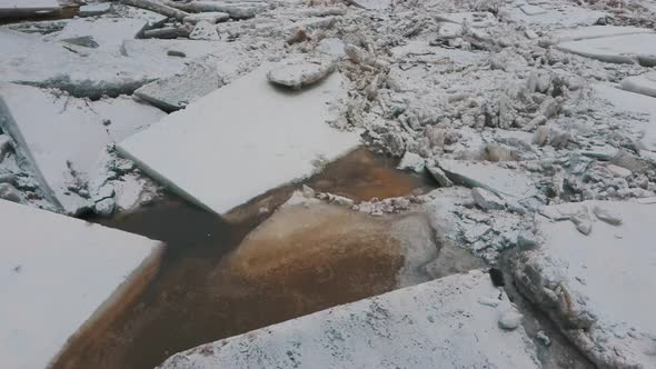 Aerial Dron Shot of the Huge Ice Loads Drift in the River Ogre, Latvia. 4K Video