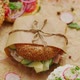 Bagels with Ham Cream Cheese Hummus Radish Wrapped in Brown Baking Paper Ready for Take Away - VideoHive Item for Sale