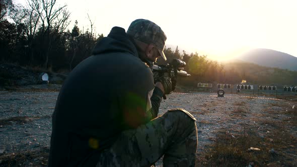 Specialist from the special forces unit fires at a military training ground from a rifle